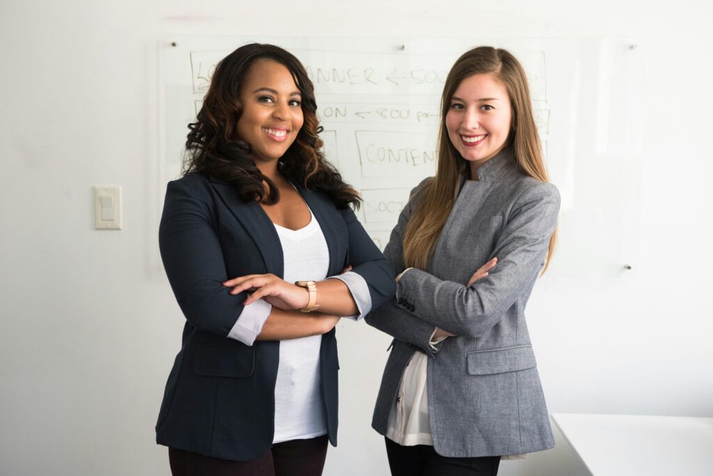 two women in business attire